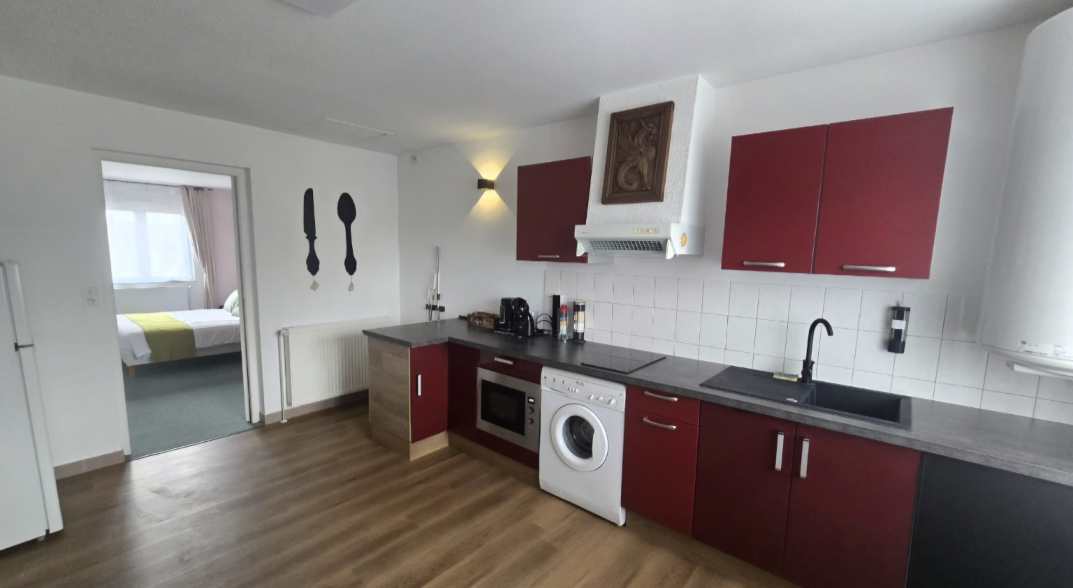 Cuisine équipée de l’Appartement 2 avec lave-linge